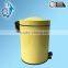 shiny yellow stainless steel step dustbin