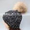 Adult size black striped pattern knitting hat with real raccoon fur bobble