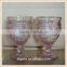 thick pink colored stem wine glass