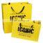 Wholesale Yellow  shopping printed paper gift custom packaging yellow paper bags