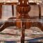Dining room antique round rotating table with leather chairs