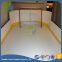 Synthetic ice rink floor panels and barriers