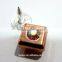 bright copper color rivet with colorful A stone