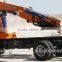 hand operated lifting equipment on truck, Model No.: SQ200ZB4, 10ton truck crane with foldable booms.