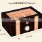 High gloss wooden humidor with a tray inside