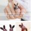 Young lady favourite diamante wine red smart rubbit rings