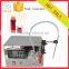 Semi automatic two nozzles small scale oil bottle filling machine