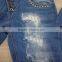 GZY cheap woman fashion Stocklots Women scratch jeans factory