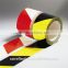 Reflective self-adhesive tape for road safety sign