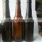 Manufacturers supply 330ml black glass beer bottles