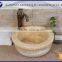 Yellow onyx basin