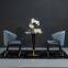 Люкс-уphолstered dining chair with a modern fabric cushion and a wooden leg frame