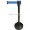 Retractable belt barrier movable in both outdoor and indoor