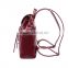 All purpose style bags leisure backpack, close by hook and tassel/fringe, nice burgundy color