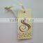 gold foil concaved hangtag with eyelet and special string and gourd pin