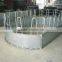 Round bale hay feeder for cattle and horse