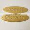 metal furniture label with embossed logo