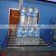 Automatic pe film shrinking wrapping water bottle packaging machine