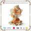Polyresin smiling sitting angel figurine