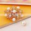 Korea jewelry wholesale gold plated zinc alloy flower shape safty pin scarf clip brooch