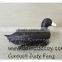 Plastic floating black-backs hunting duck