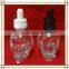e liquid bottle 30ml skull head shape glass dropper bottle with childproof cap