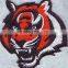 Iron on embroidered patch for custom apparel.