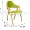 green color fabric indoor wood chair