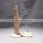 25cm height female left wooden hand beech wood with round wooden base an articulated hand