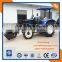 Farm tractor with front loader and backhoe loader