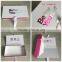 White and pink custom cheap apparel packaging ribbon closure logo hot stamping