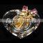 Cheap crystal glass heart shape music box with gold rose for wedding favors/gift
