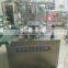 Rotary type plastic cup filling and sealing machine