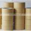Kraft paper reinforced with strong fiberglass yarns adhesive bonds to corrugated even in dusty or dirty conditions