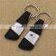 Wholesale free deisgn black genuine / pu leather keychain with embossed logo