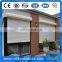 Aluminium window with mosquito net and shutter in one
