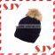 Rear rabbit fur pompom knitted beanie hat