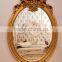 Graceful flower carving oval wall mirror