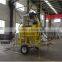 Combined rotary seed cleaner and seed treater