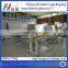 Film packing machiine with turning working table
