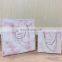 Wholesale custom pink marble bag packaging shopping paper bag with handles