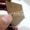 camel color jeans leather label/metal plate in the middle