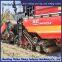 The harvester has been retrofitted with anti sinking half chain rail mud for stable and reliable leveling