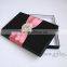 Elegant black packaging boxes for wedding invitations
