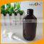 10 oz Cone Top Round Amber Lotion Bottle with White Pump Sprayer