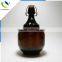 New design 64 oz / 2 L/2000 ml amber beer growler bottle with flip top cap /swing top