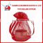 Red ribbon drawstring organza gift bag