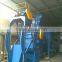 Tumble belt batch shot blast machine/system