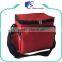Red insulated shoulder lunch bag with side bottle pocket