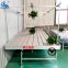 Greenhouse metal ebb flow rolling bench with tray, rolling table